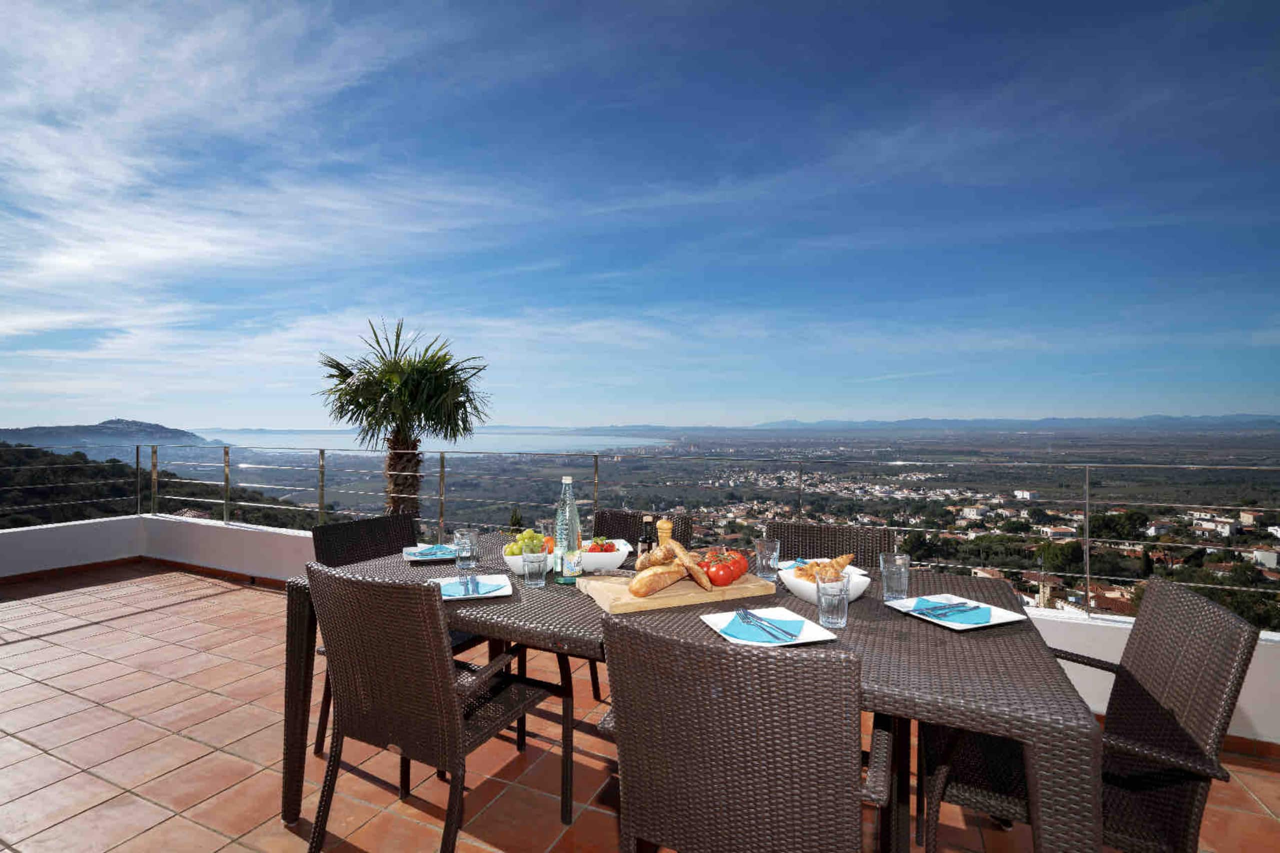 Outdoor dining table with panoramic bay view