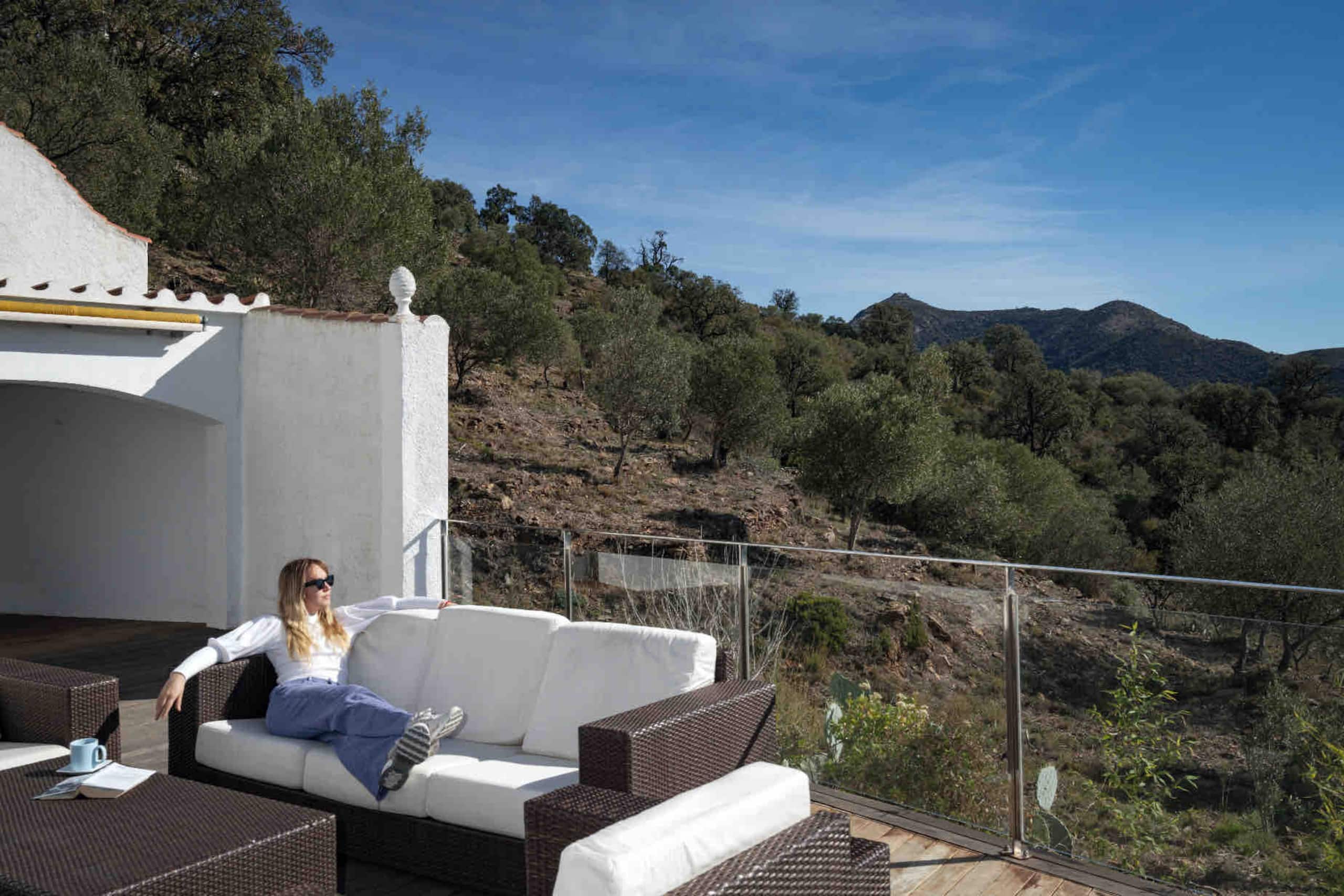 Terrace seating with mountain backdrop